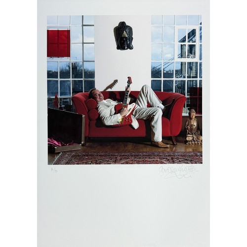95 - Gered Mankowitz (born 1946) - Phil Manzanera with guitar, 2002, printed later, colour artist proof p... 