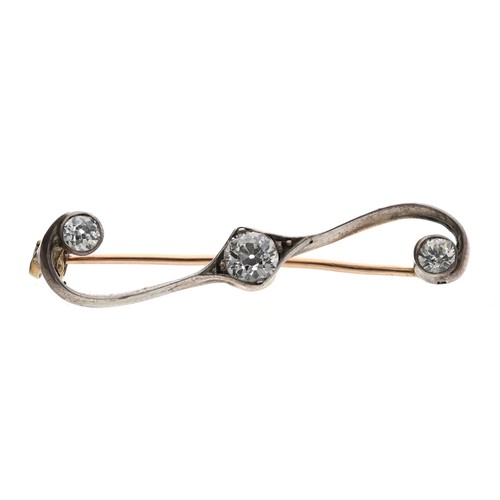 55 - Attractive bicolour scroll design diamond brooch, with three old-cut diamonds, 0.60ct approx in tota... 