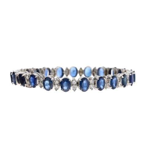 26 - Good modern 18ct white gold sapphire and diamond bracelet, consisting of twenty-three oval sapphires... 