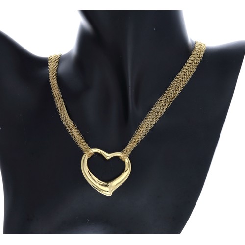 38 - Tiffany & Co. Elsa Perretti 18ct Heart pendant on a mesh chain, the pendant 11.4gm, the necklace... 