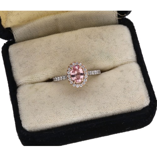 22 - GIA Certified attractive pink sapphire and diamond white metal cluster ring with set shoulders, the ... 