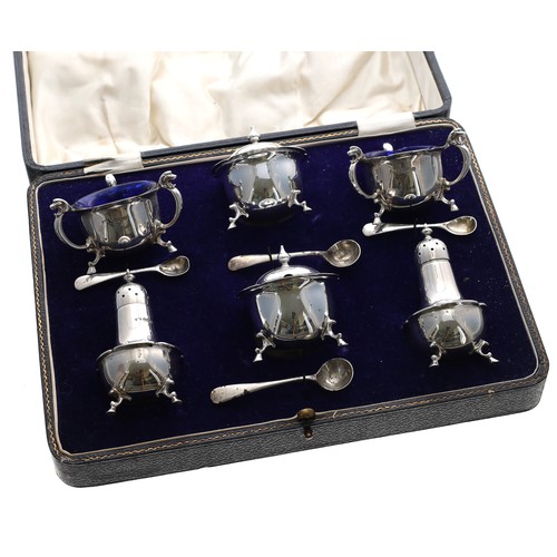 17 - Edwardian silver six piece cruet set in a fitted case, consisting two peppers, 3.25'' high approx, t... 