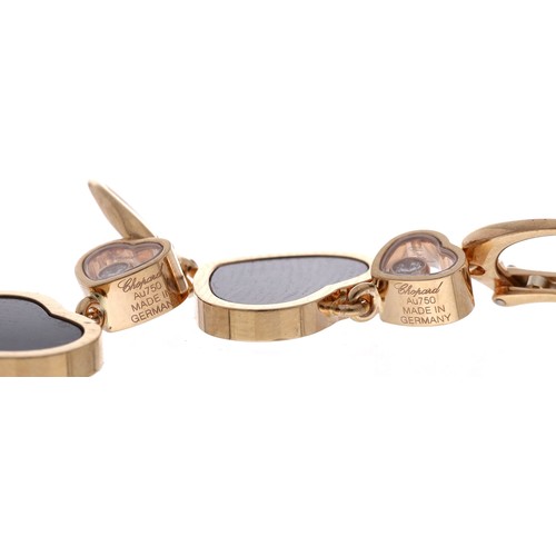 45 - Chopard Happy Hearts 18ct rose gold black onyx and diamond bangle and earring set, the bangle with f... 
