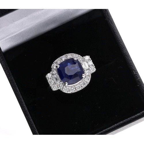 37 - Impressive certificated 18ct white gold cushion sapphire and mixed-cut diamond cluster ring, the sap... 
