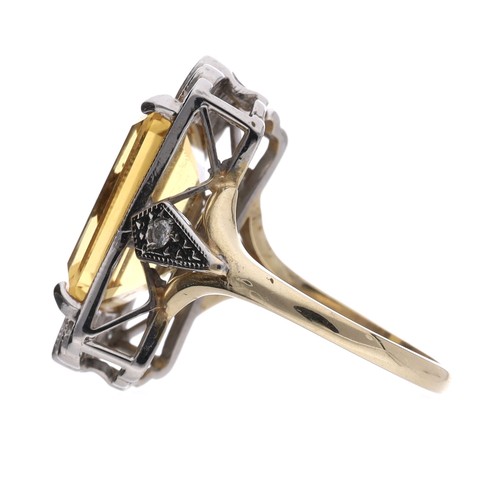 41 - Attractive 9ct bicolour citrine and diamond dress ring, the citrine 11.50ct, the diamonds 0.24ct in ... 