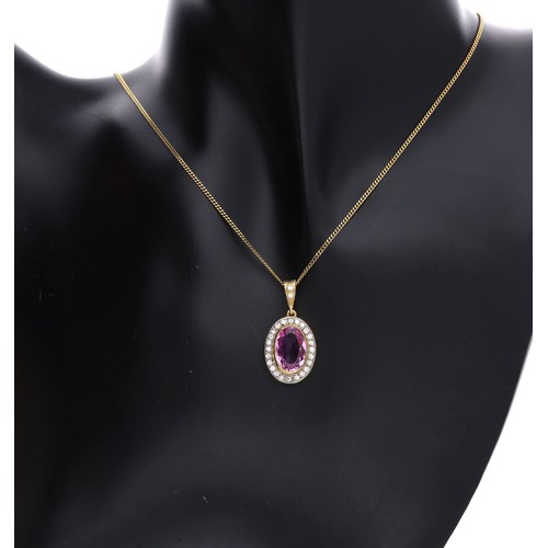 60 - 18ct yellow gold oval pendant set with pink topaz and diamonds on a yellow gold plated silver chain,... 