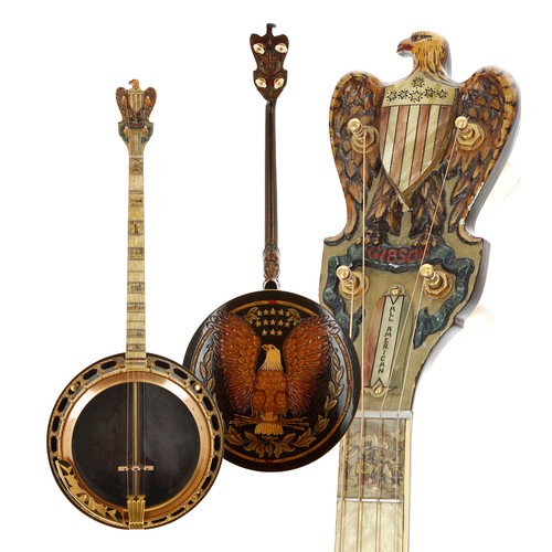 Gibson Mastertone 'All American' Tenor Banjo #9747-5, 1931, having a carved Gibson American eagle head and a pearloid fingerboard decorated with scenes of American history, gold plated engraved hardware, further scroll carving and hand painting to the neck, sides and back of the resonator with arrows, scrolls and a large eagle holding arrows under the state stars, bearing a Gibson Mastertone Guarantee decal to the inner and inscribed 9747-5 to the resonator, 11" diameter head, 23" scale length, hard case
