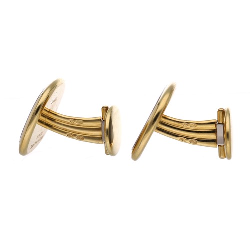 90 - Pair of Patek Philippe Ellipse 18ct yellow gold cufflinks, with blued steel centres, 27.7gm, signed,... 