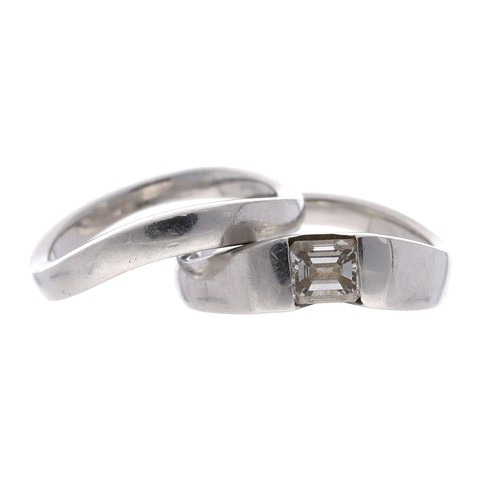 107 - Platinum emerald-cut diamond platinum ring with a fitted band ring, 0.45ct approx, clarity VSI, colo... 