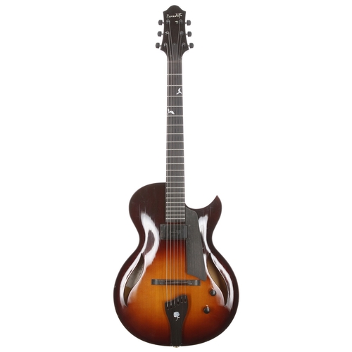 2015 Bob Benedetto Bambino Elite Custom hollow body electric guitar, made in USA; Body: vintage sunburst finished spruce top with maple back and sides, various knocks and blemishes, edge blemishes to top with drop fill, lacquer checking to finish; Neck: maple; Fretboard: ebony; Frets: good; Electrics: working; Hardware: good; Case: original Calton Benedetto branded hard case; Weight: 2.25kg; Overall condition: good