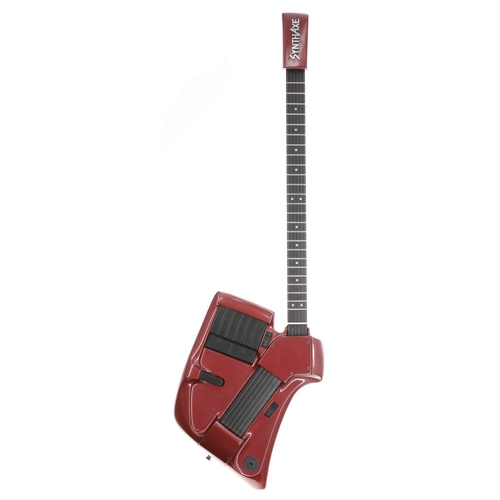 1985 SynthAxe guitar controller, made in UK, red finish, within heavy duty flight case, including SynthAxe pedal unit