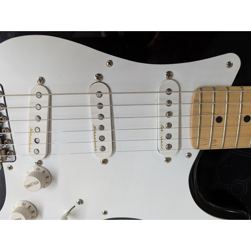396 - Fender Eric Clapton Blackie Signature electric guitar, made in USA; Body: black finish, light surfac... 