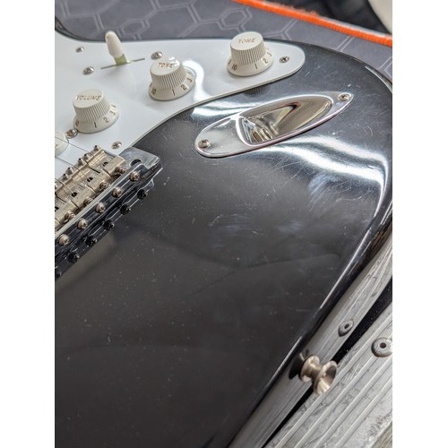 396 - Fender Eric Clapton Blackie Signature electric guitar, made in USA; Body: black finish, light surfac... 