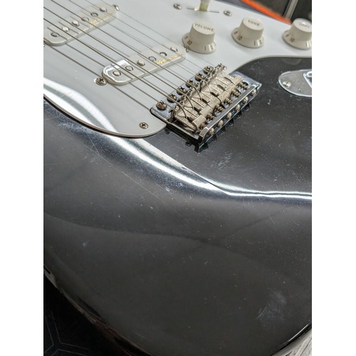 396 - Fender Eric Clapton Blackie Signature electric guitar, made in USA; Body: black finish, light surfac... 