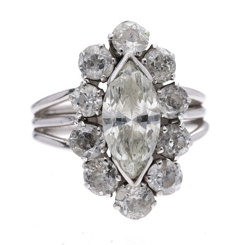Fine diamond marquise shaped white metal cluster ring, the marquise brilliant-cut diamond 1.34ct approx, clarity I1, colour J/K, in a border of ten old-brilliant-cut diamonds 1.50ct approx in total, in a white metal shank with triple split shoulders, 5.4gm, width 19mm, ring size I
