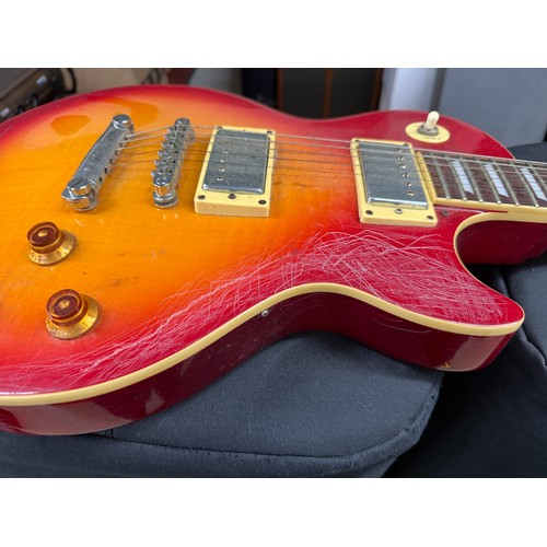 870 - 2001 Epiphone Les Paul Standard electric guitar, made in Korea; Finish: Sunburst, heavily scratched ... 