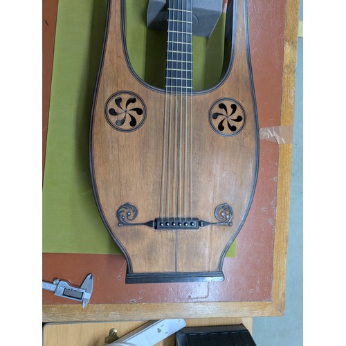 2405 - 19th century French lyre guitar, by and labelled Pons, Luthier A. Grenoble...1810, with symmetrical ... 
