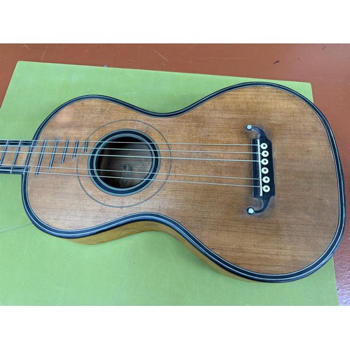 2413 - Early 19th century Mirecourt guitar, labelled N. Rigondeau, 1822; Back and sides: maple, refinished;... 