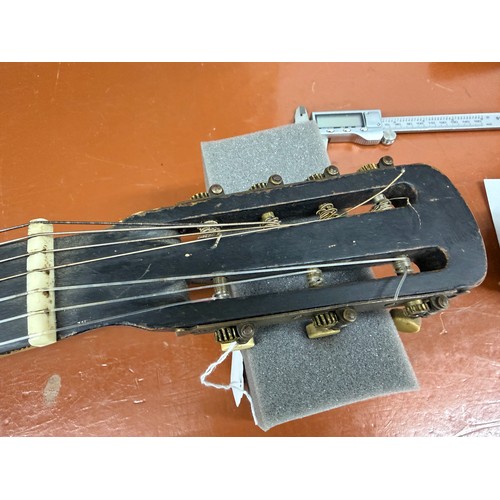 2410 - Interesting 19th century German seven string Wappen style guitar; Back and sides: dark stained maple... 