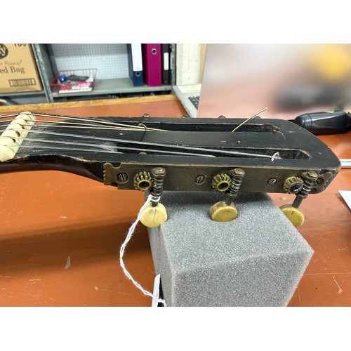 2410 - Interesting 19th century German seven string Wappen style guitar; Back and sides: dark stained maple... 