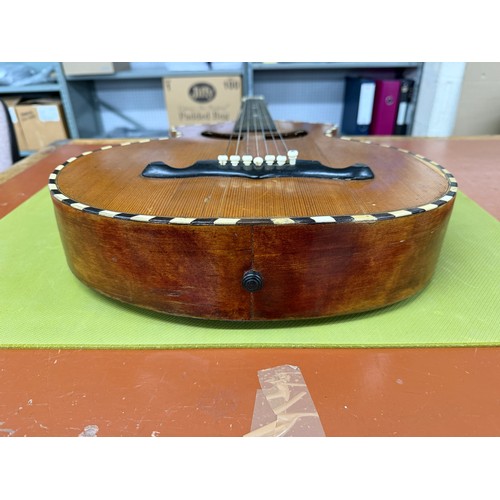 2410 - Interesting 19th century German seven string Wappen style guitar; Back and sides: dark stained maple... 