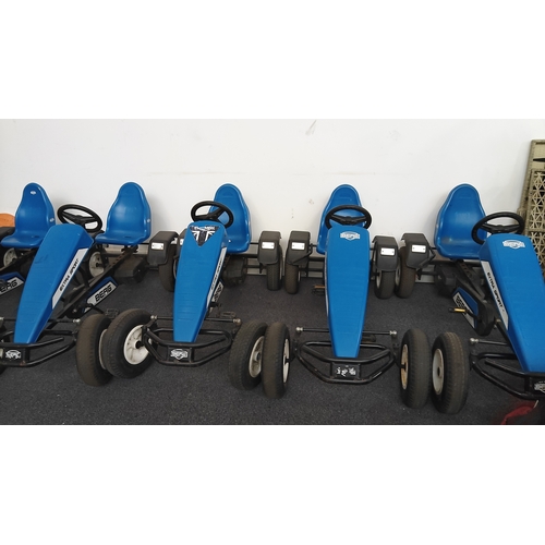 135 - Inflatable go cart track with 4 kids and 5 adult pedal carts