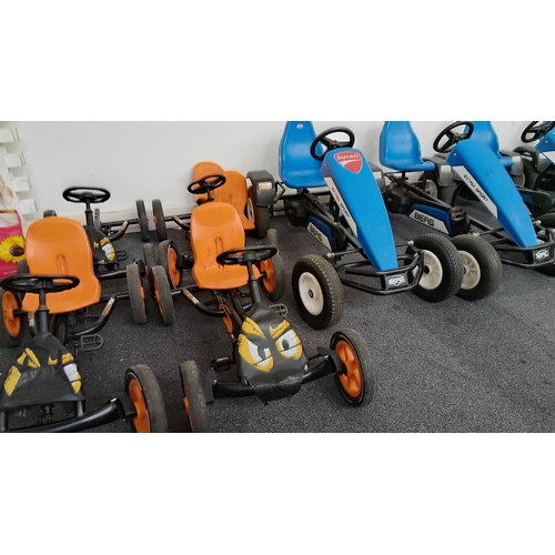 135 - Inflatable go cart track with 4 kids and 5 adult pedal carts