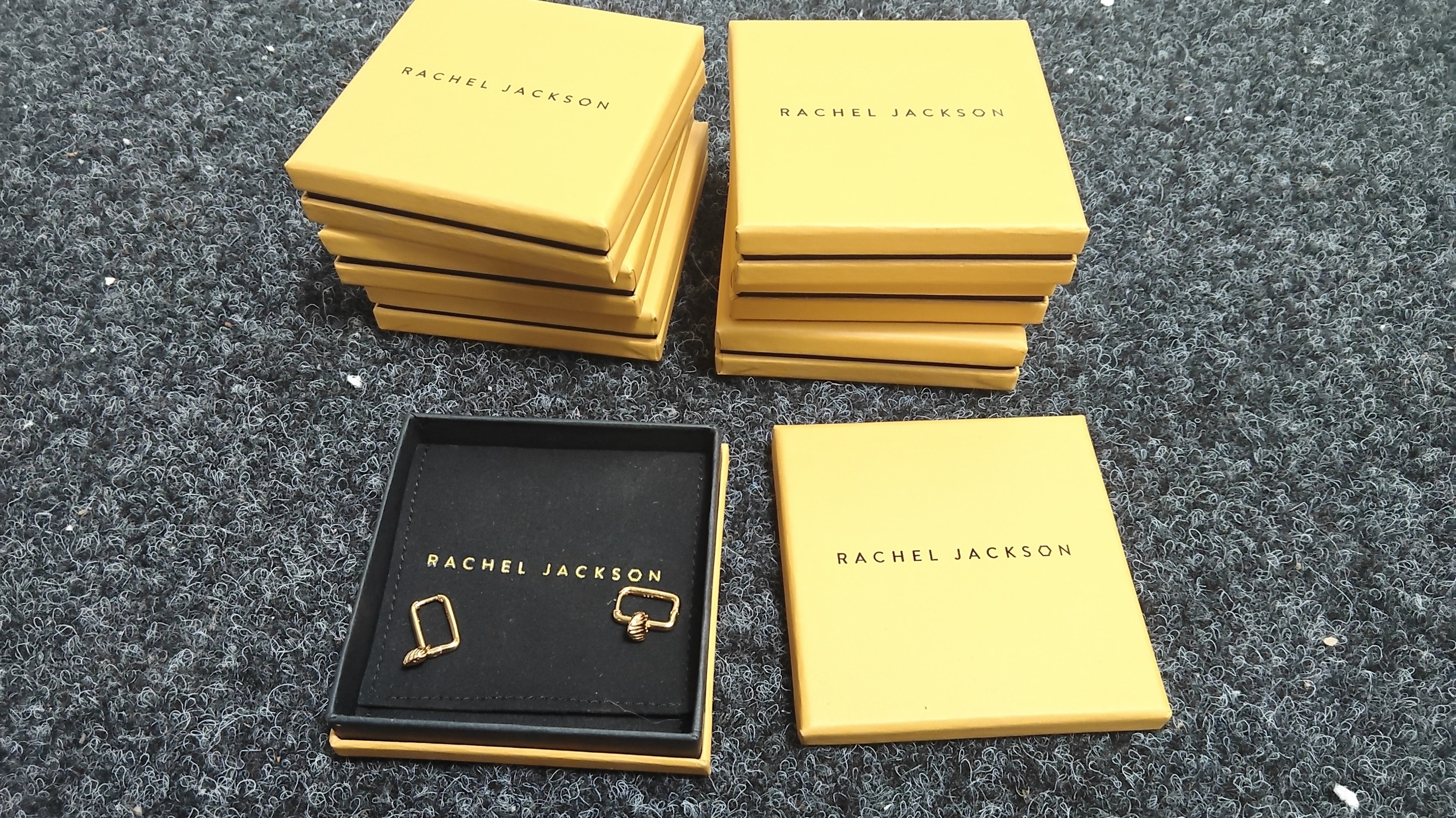 7 boxes of Rachel Jackson earrings
