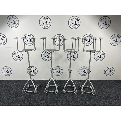 110 - Four 32” Tall Metal Candle Stick Holders - Used