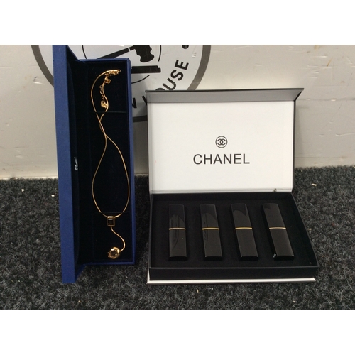 205 - Chanel lipstick set and swarovski necklace