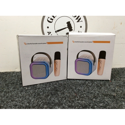 210 - 2 colorful karaoke sound system.