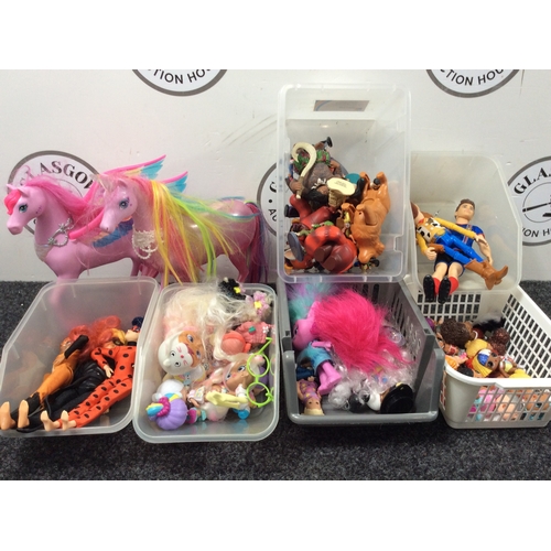 235 - 6 bundles of small lol dolls and trolls and 2 kids horses.