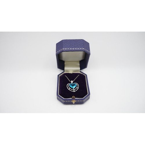 82 - 7.78g 18ct White Gold Diamond And Blue Gemstone Pendant