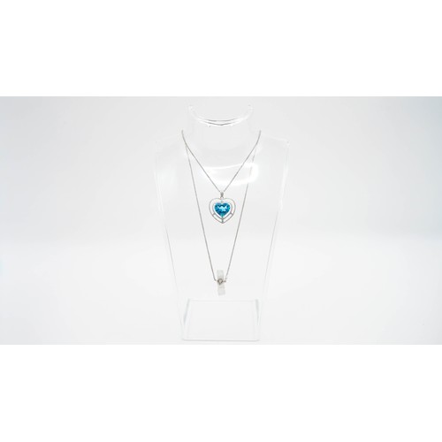 82 - 7.78g 18ct White Gold Diamond And Blue Gemstone Pendant