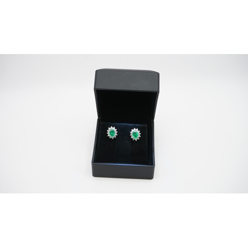 83 - 18ct White Gold Diamond & Emerald Earings