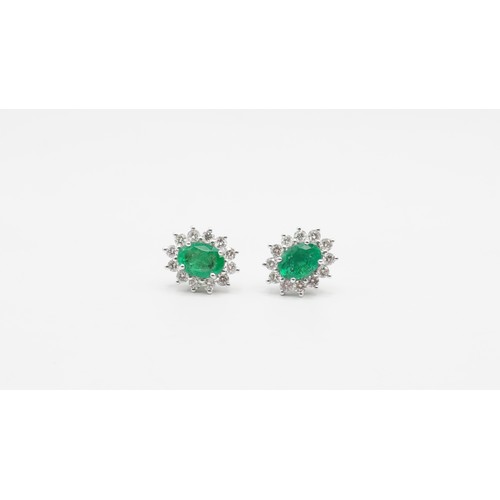 83 - 18ct White Gold Diamond & Emerald Earings