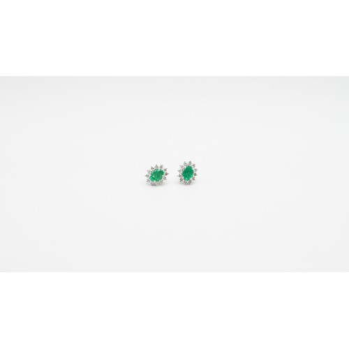 83 - 18ct White Gold Diamond & Emerald Earings