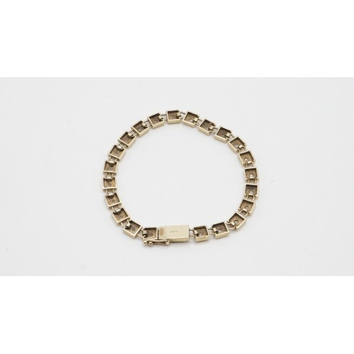 87 - 14.60g 9ct Gold And Diamond Bracelet