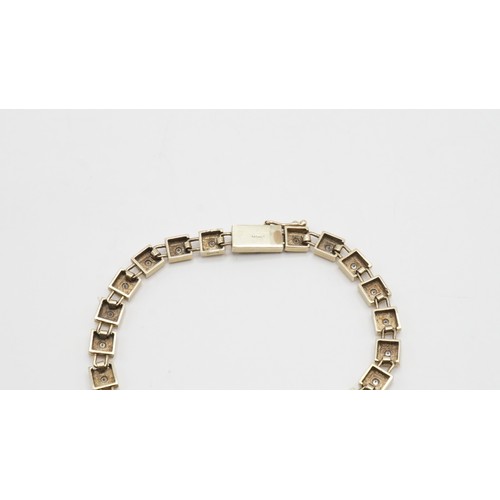 87 - 14.60g 9ct Gold And Diamond Bracelet