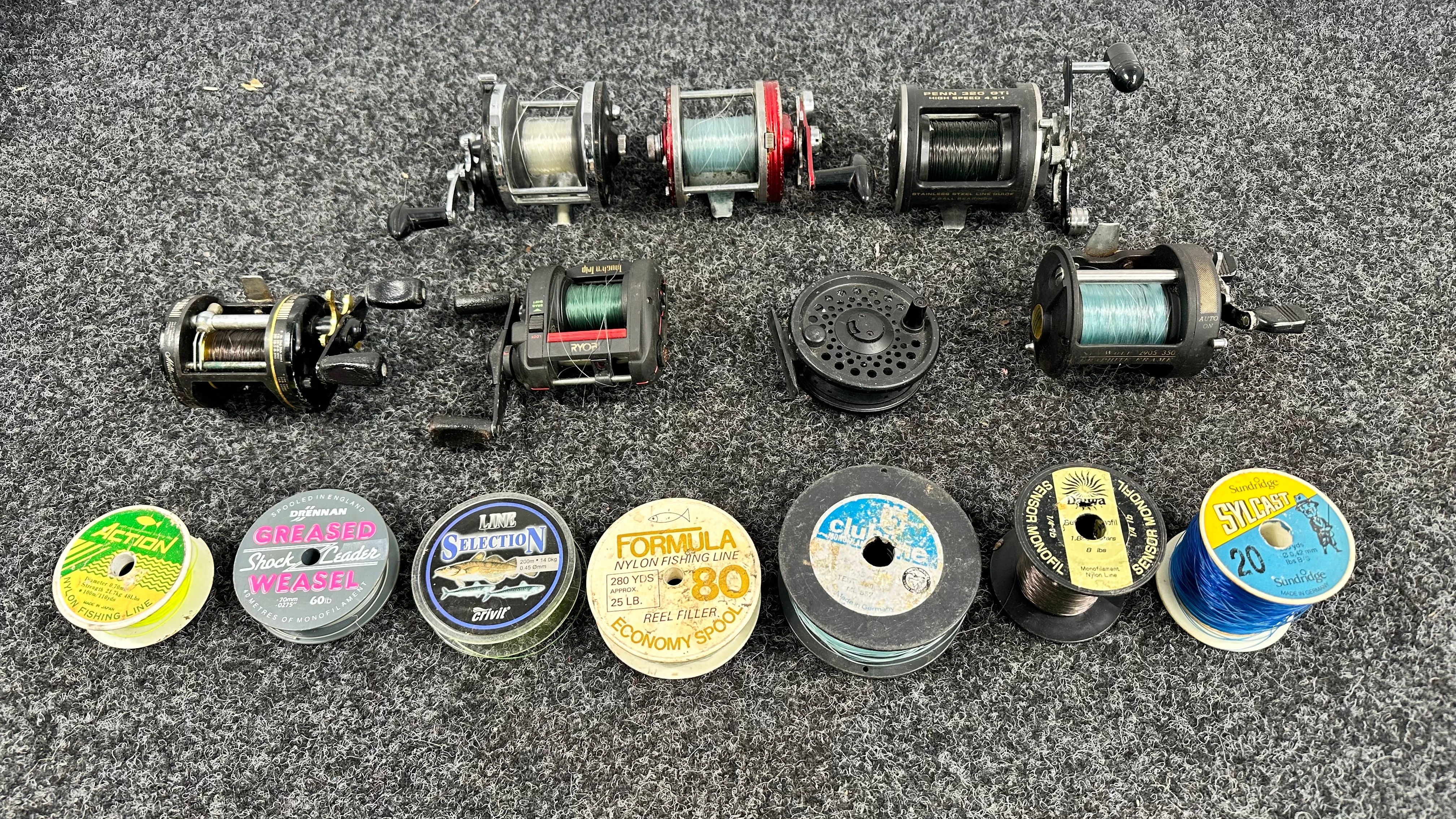 7 Fishing Reels & 7 Rolls of Line