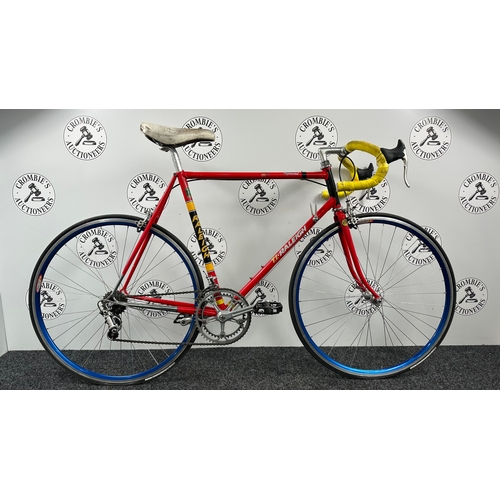 Vintage 1985 TI-Raleigh Team Professional Replica Road Racing Bicycle - An Exceptional, Highly Collectible Example Of British Cycling Heritage: A Vintage 1985 Ti-raleigh Team Professional Replica Road Racing Bicycle. Finished In The Legendary Red, Black, And Yellow Ti-Raleigh Team Livery Made Famous During Their Era-defining European Road Racing Dominance.