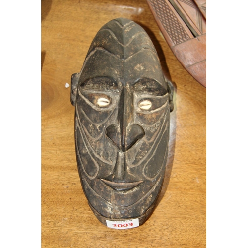 2003 - African: a tribal mask, with cowrie shell eyes.