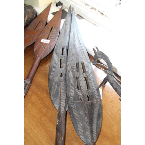 2005 - African: a Benin Jekri paddle, the crocodile form blade pierced and carved; together with another, 9... 