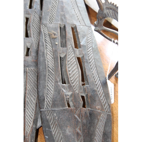 2005 - African: a Benin Jekri paddle, the crocodile form blade pierced and carved; together with another, 9... 