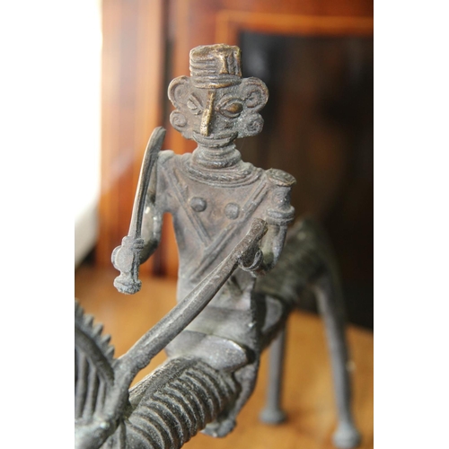 2006 - An Indian Orisa bronze figure on horse,  33cm long.