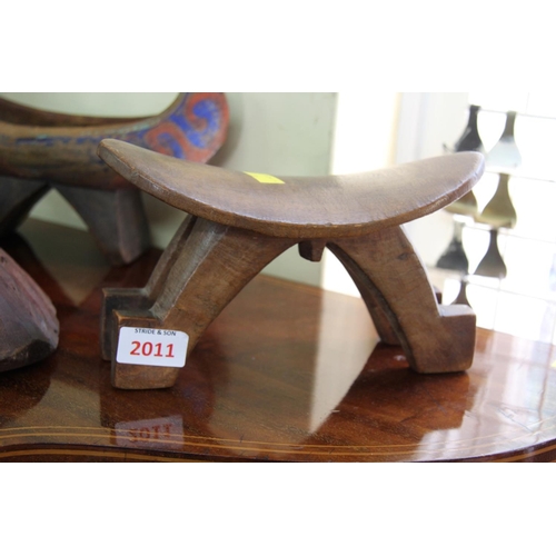 2011 - African: two wooden carved head rests, largest 24cm wide.