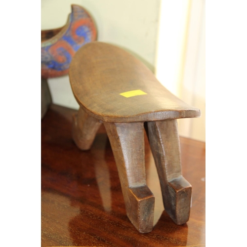 2011 - African: two wooden carved head rests, largest 24cm wide.