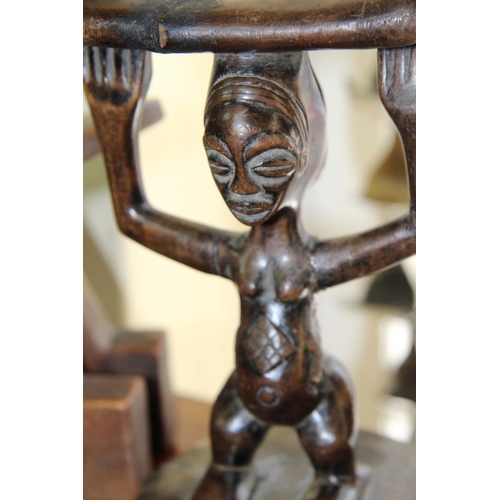 2011 - African: two wooden carved head rests, largest 24cm wide.