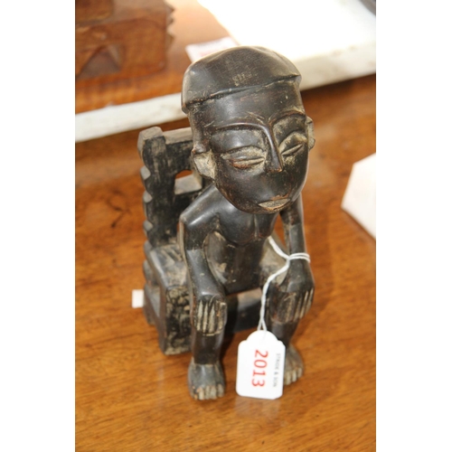 2013 - African: a Nigerian carved seated figure.