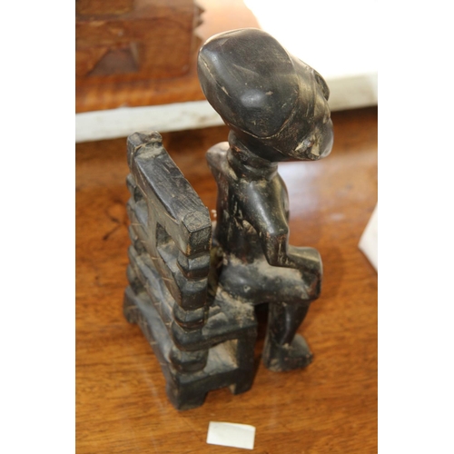 2013 - African: a Nigerian carved seated figure.